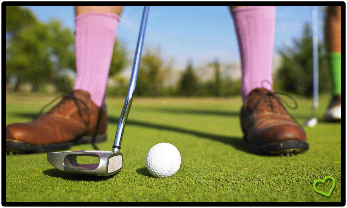 From Golf with Love: Golfer with hot socks on putting green.